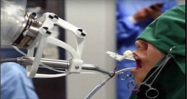 Robot independently places 3-D printed implants in a patient in China