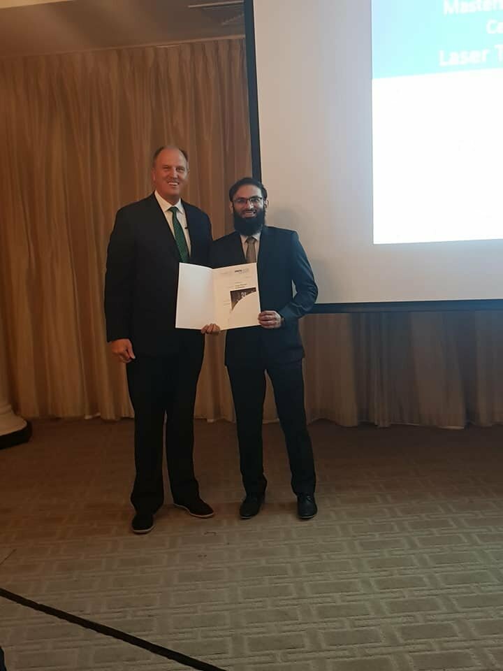 Dr Adil receiving his Certificate from Prof. Gutknecht during the graduation ceremony