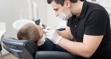 Dentist turns primary teeth black to explore caries management options