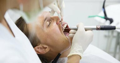 Root canal therapy versus dental implant