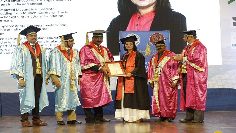Dr.Anita Doshi (right Centre) being confered the Diplomate certificate by Chairman IBP, Dr.Padmanabhan T. Picture IPS