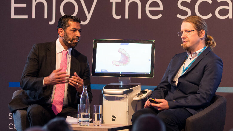 Dr Sameer Puri in conversation with Dr Björn Voss (System Engineer R & D at Dentsply Sirona). (Photograpah: Dentsply Sirona)